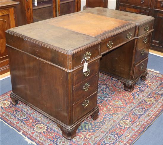 A Georgian style walnut pedestal desk W.138cm